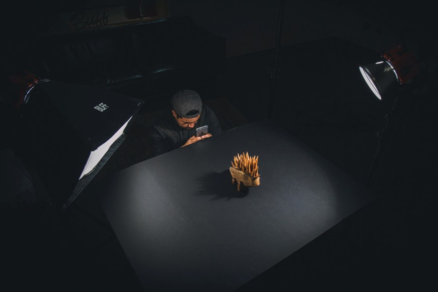 Woodworker and photographer Luis Gonzalez photographing his sculpture with his iphone at Fort Houston in Nashville photographed by Taylor Smith