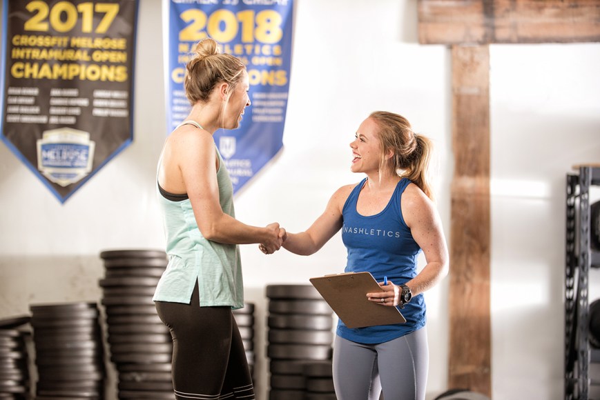 Audra Oden photographs a coach and client at Nashletics.