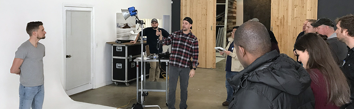 Jeff Carpenter of Readylight Media speaks to the Next Level Lighting workshop attendees with model Hunter Hethcoat at Westlight Studios in Franklin, TN.