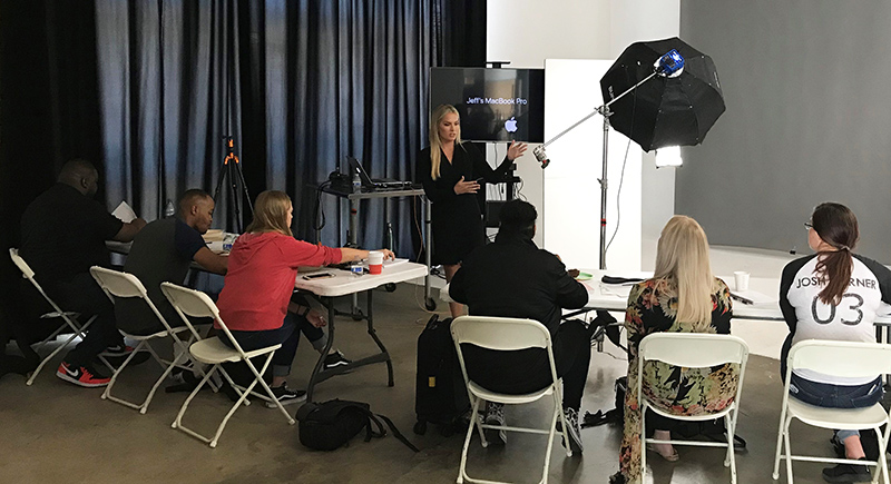 Allee-Sutton Hethcoat shares posing tips with the Next Level Lighting Workshop attendees