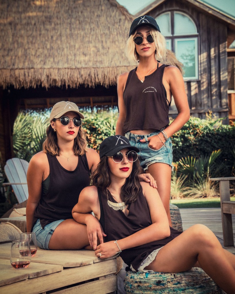 Jessica Wagner, of The Weekender blog, photographed by Robert Wagner, with family outside the Tribe Kelley Surf Post