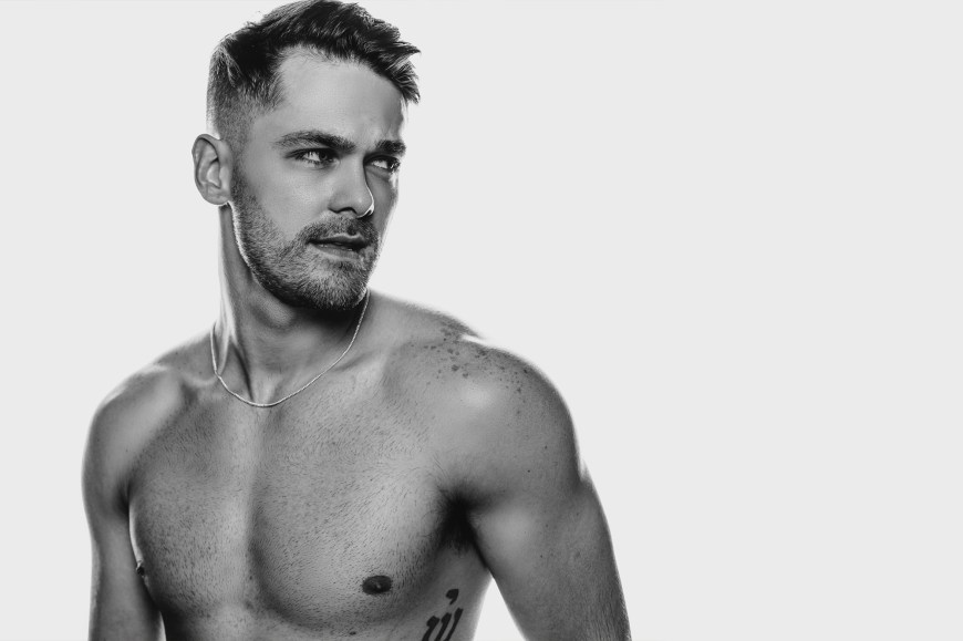 Black and white high key portrait of male model Jacob Matthew Agy photographed by Anthony Romano