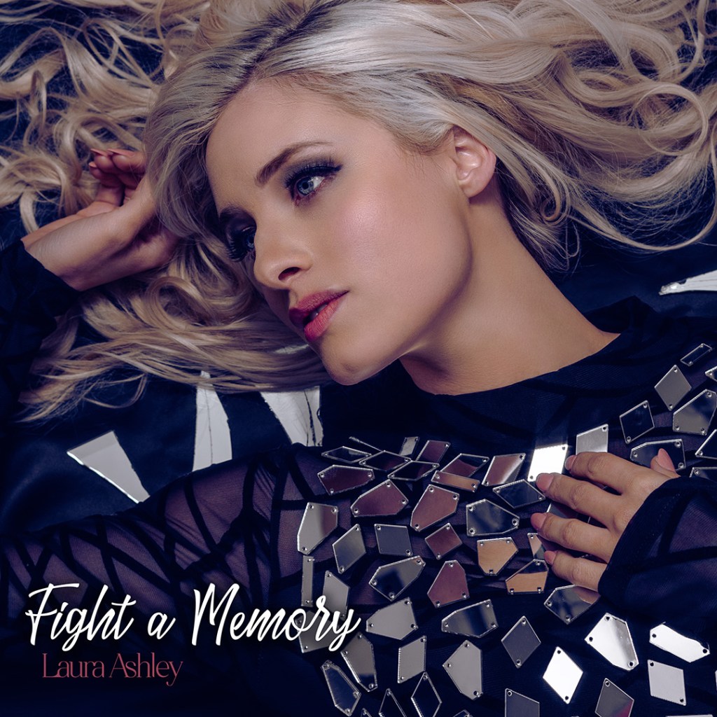 'Fight a memory' by Laura Ashley single art. Woman in mirrored dress laying on the floor.